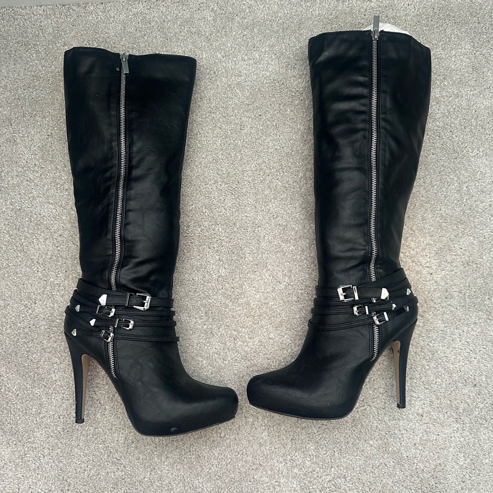 Aldo black knee high boots.